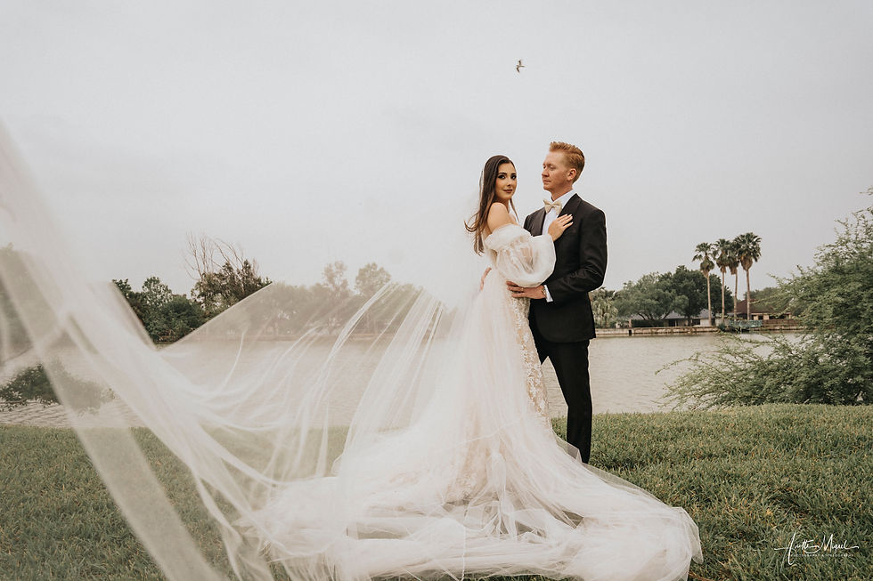Eye-level view of a wedding photographer capturing a bride and groom