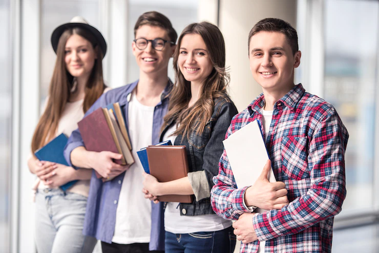 group-happy-young-students-university_85574-4531.webp