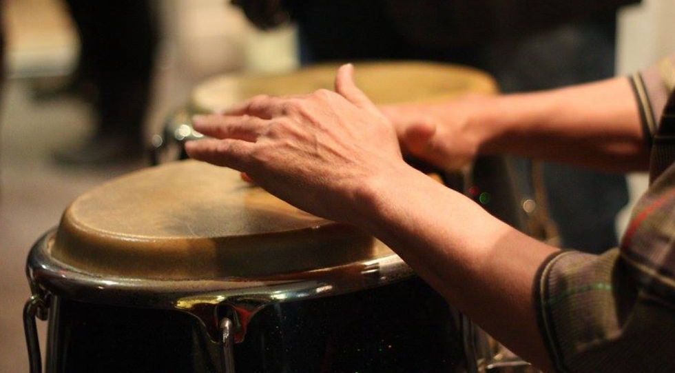 Hands with drums CU.jpg