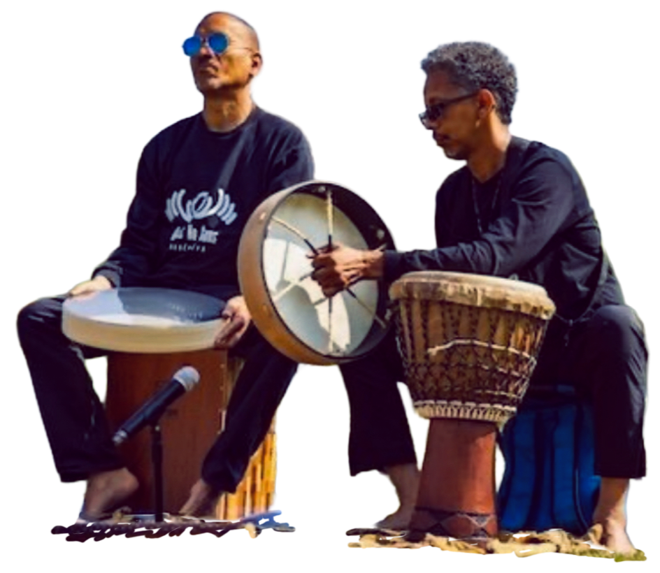 Ram Bhagat in cool shades with drums and fellow drummer trans_edited.png