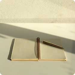 Open notebook prepared for commercial planning and strategic thinking.