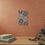 Thumbnail: 7.9”x11.8” Mandala Essence Aluminum Panel on a neutral wall, radiating peaceful mandala design and balance.