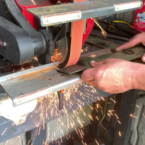 The Importance of Sharpening and Balancing Lawnmower Blades