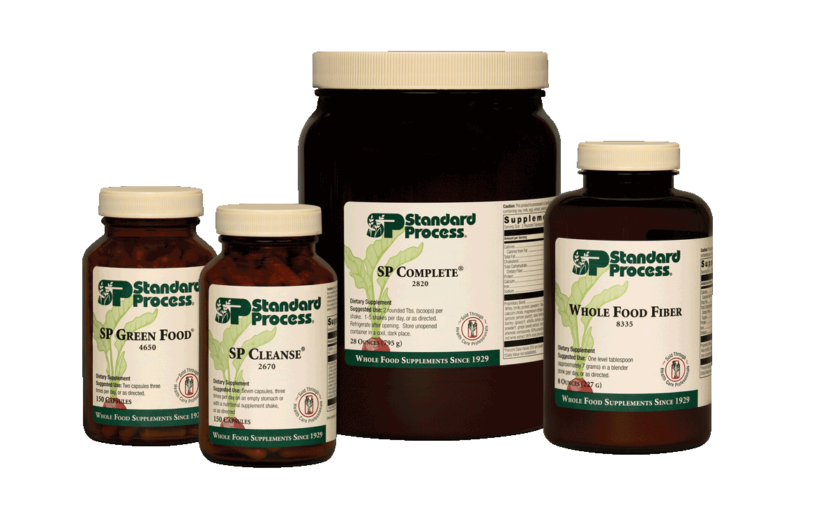 Standard Process 21-day purification kit with products SP Green Food, SP Cleanse, SP Complete, and Whole Food Fiber pictured from left to right.