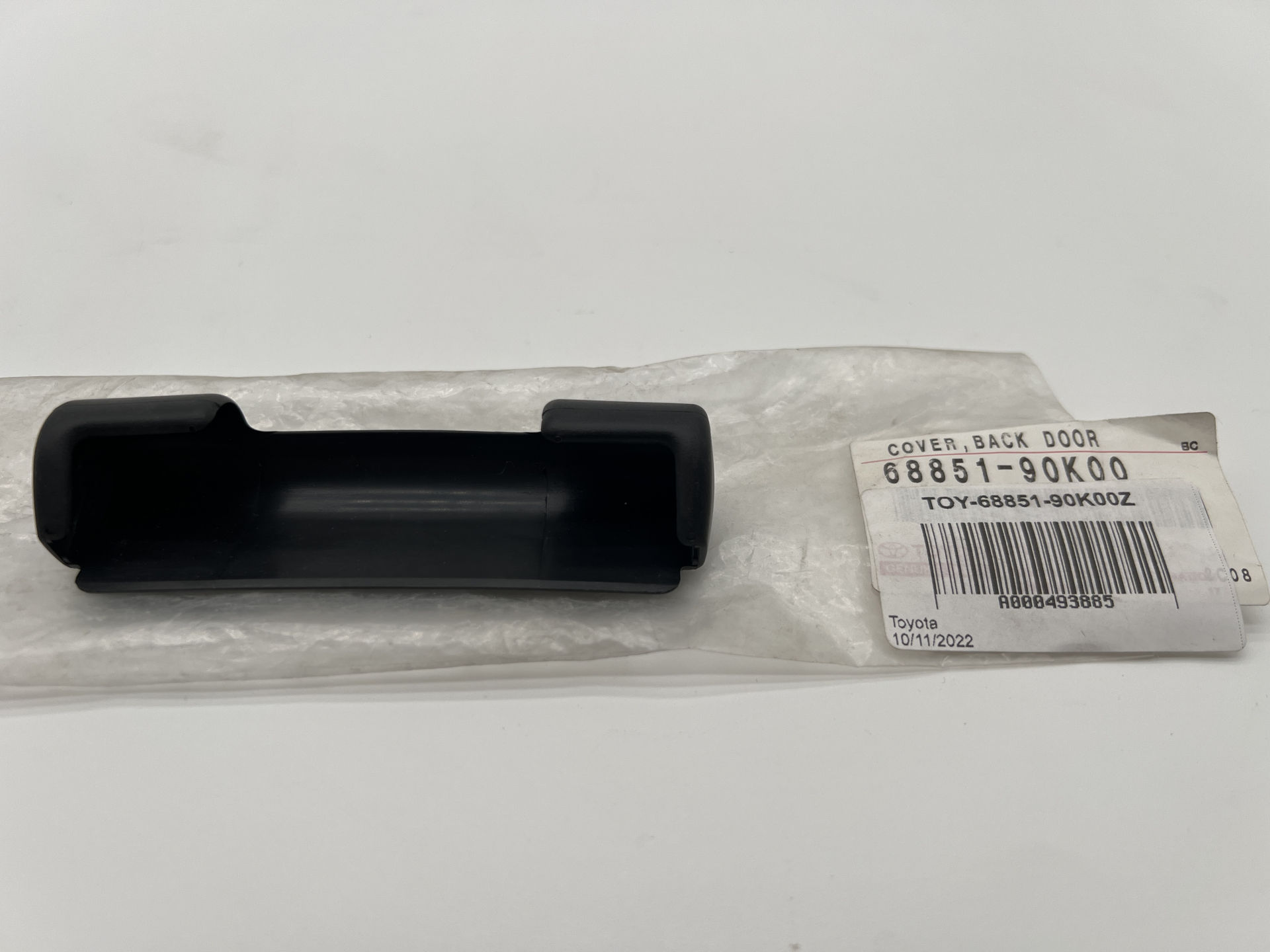 Cache plastique de charnière de porte arrière inférieure  68851-90K00