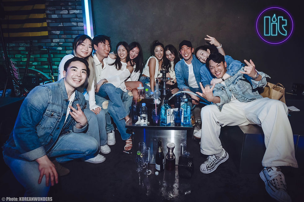 Friends having fun at a VIP Table at Lit Lounge Itaewon in Seoul, South Korea