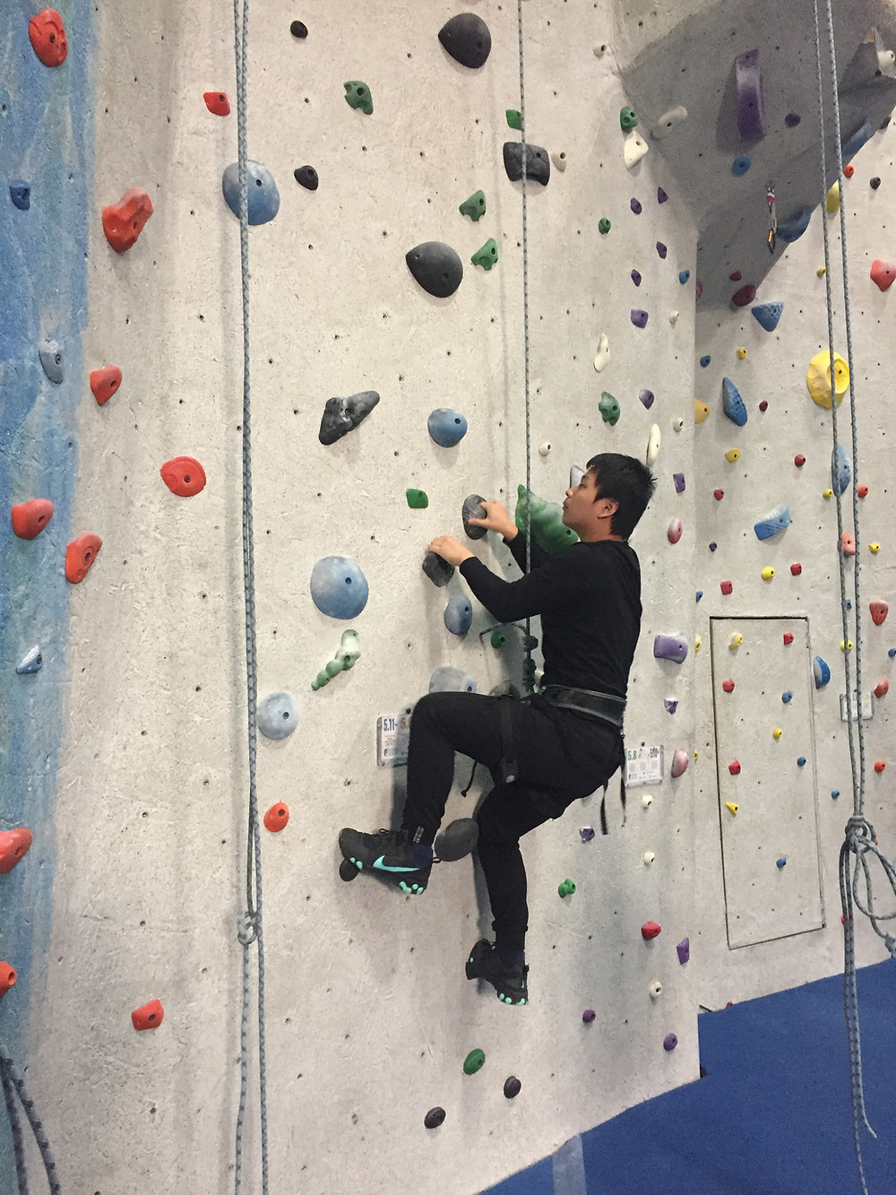 Student Gary Chen begins his ascent