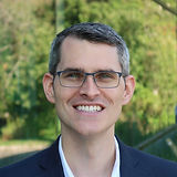 Giles 2021 Headshot (cropped - circle)(compressed).JPG