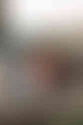 little girl sweeps porch