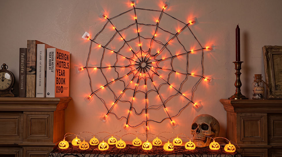 Aesthetic orange LED spider web lights casting a vibrant spooky neon glow next to a Halloween skull layout.