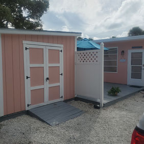 Alt text
Fully repainted beach house exterior showing immaculate wood siding, a stained deck, and crisp window frames in Englewood, Florida by Best Paint Lines.