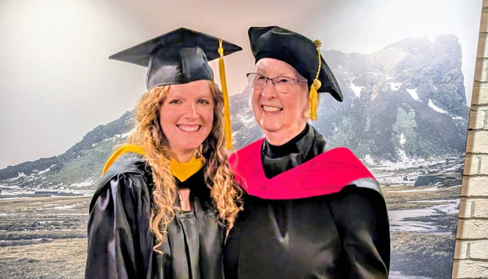 RMC Grad Laura Petrillo and her Program Coordinator Dr. Virginia Hooper