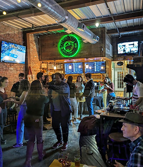 people dancing in a brewery