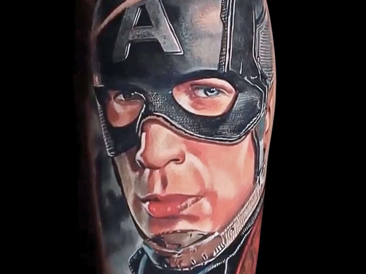 Realistic color tattoo artwork by Fame Tattoos
