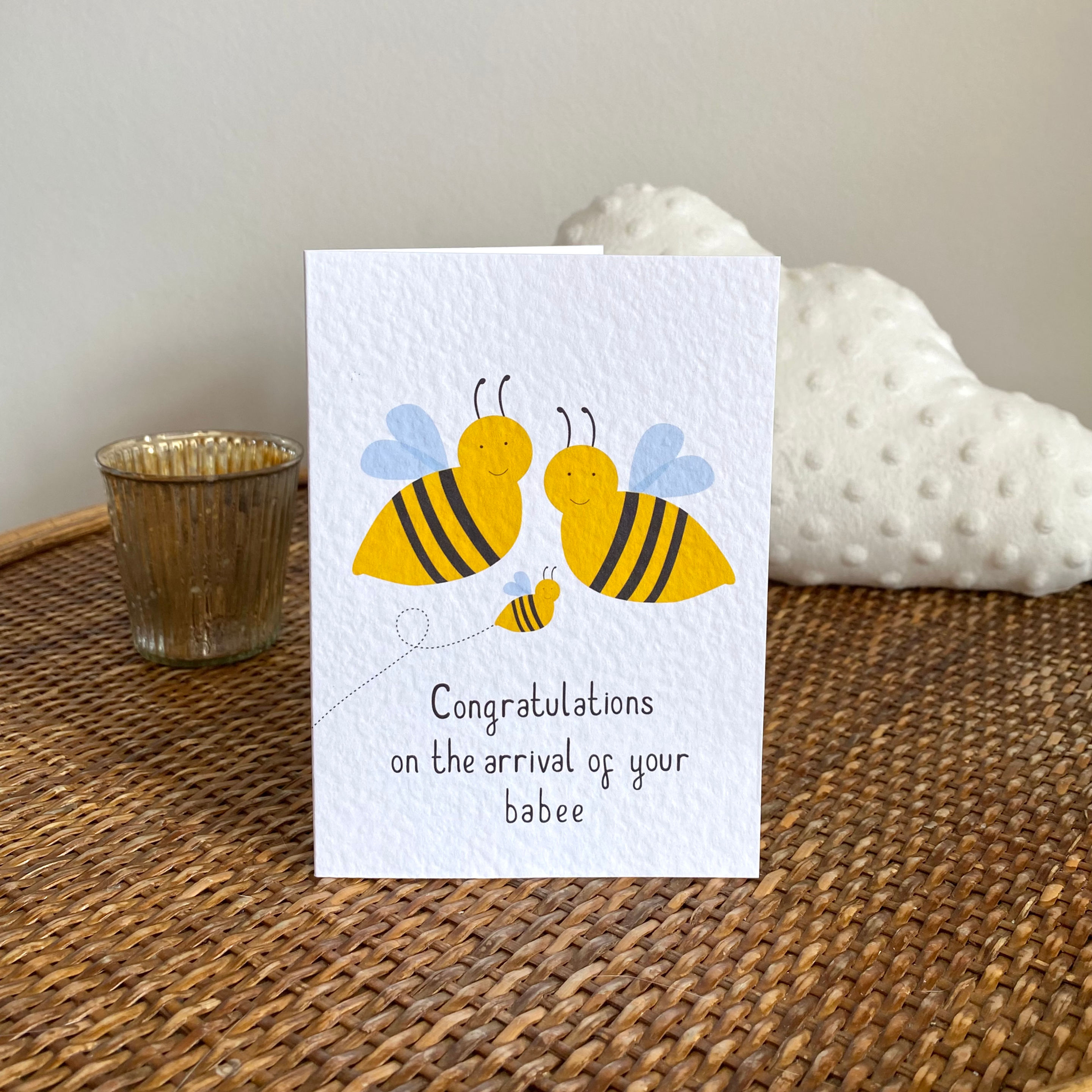 New baby card- "Congratulations on the arrival of your babee"