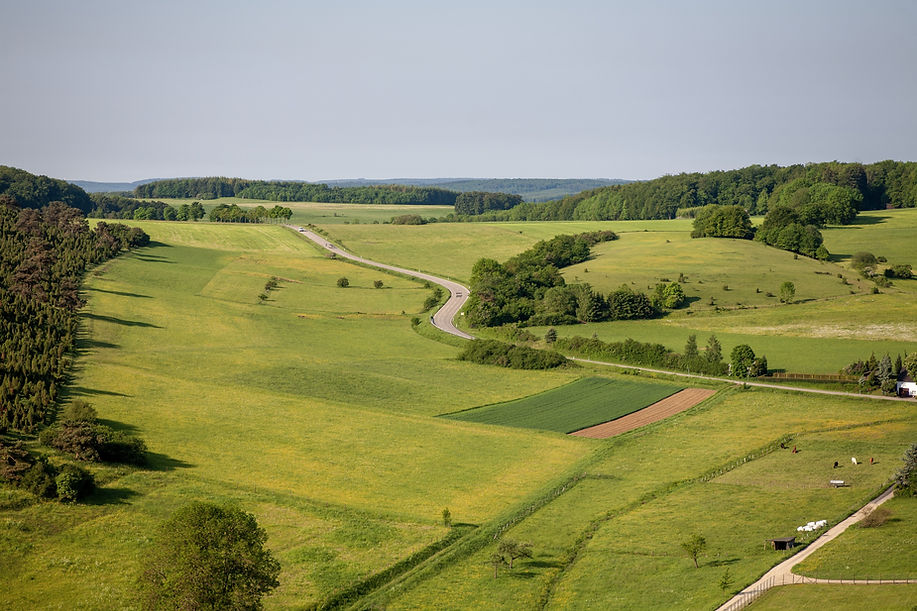 aerial-shot-farmland-clear-sky-eifel-region-germany.jpg