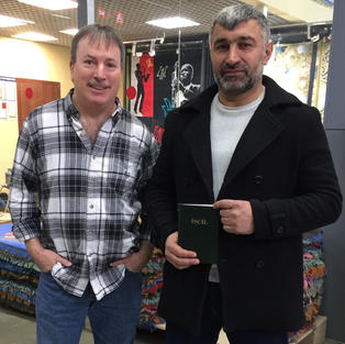 Russia Muslim with Bible.jpeg