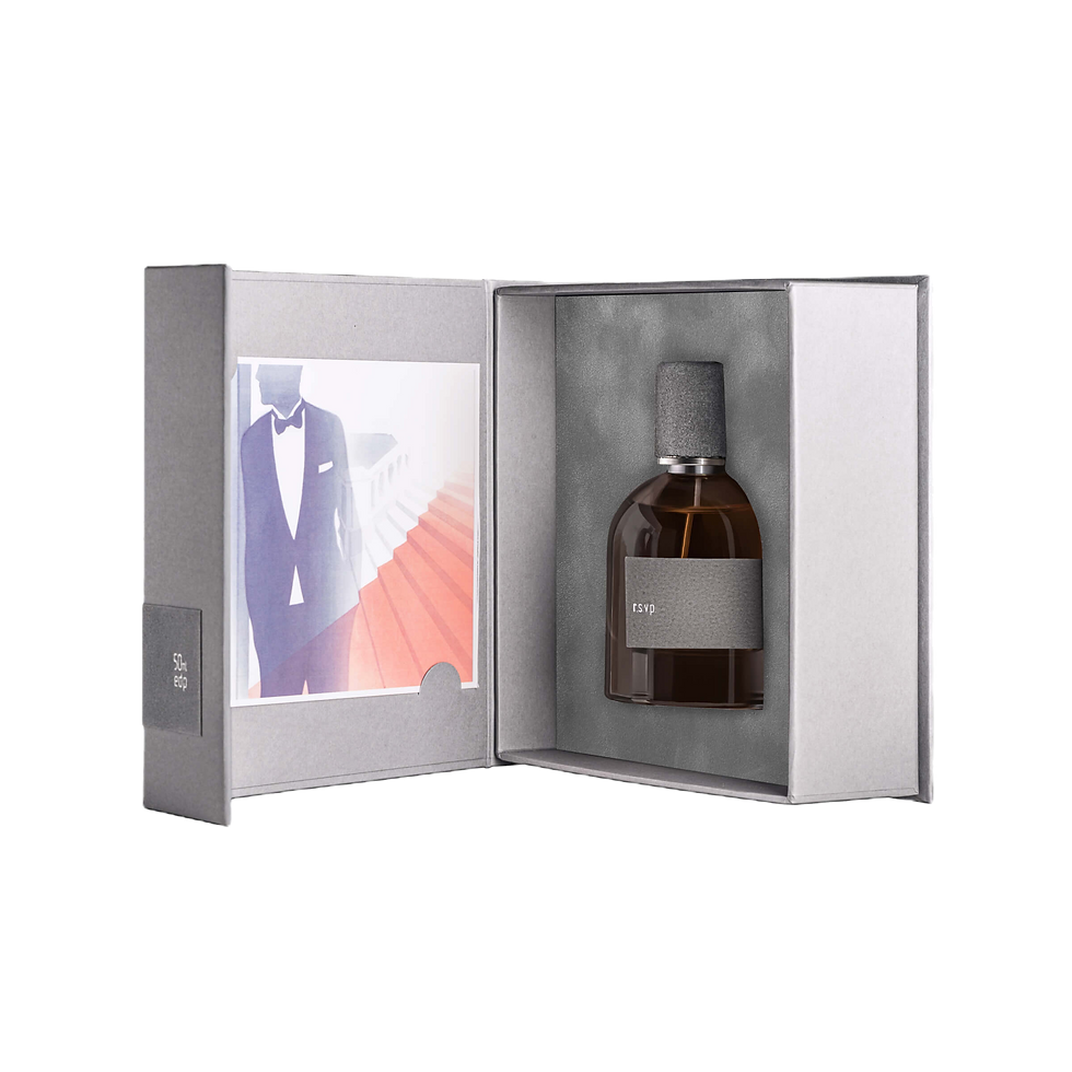 Niche citrus perfume in a gray gift box with man in tuxedo.