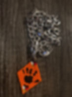 beaded Every Child Matters pendant on a silver chain