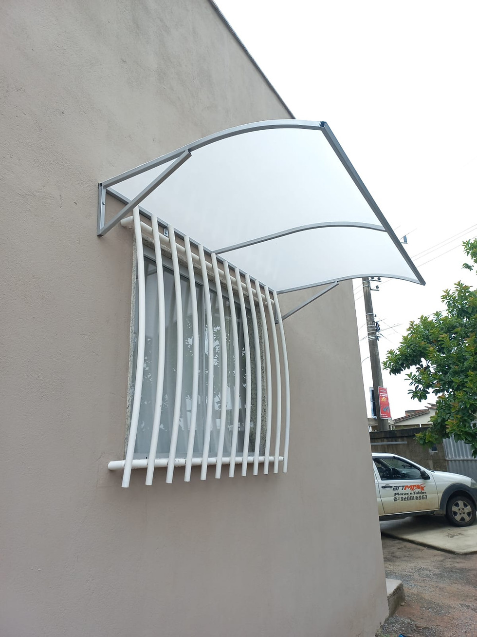 Miniatura: Toldo de Janela Curvado de Lona