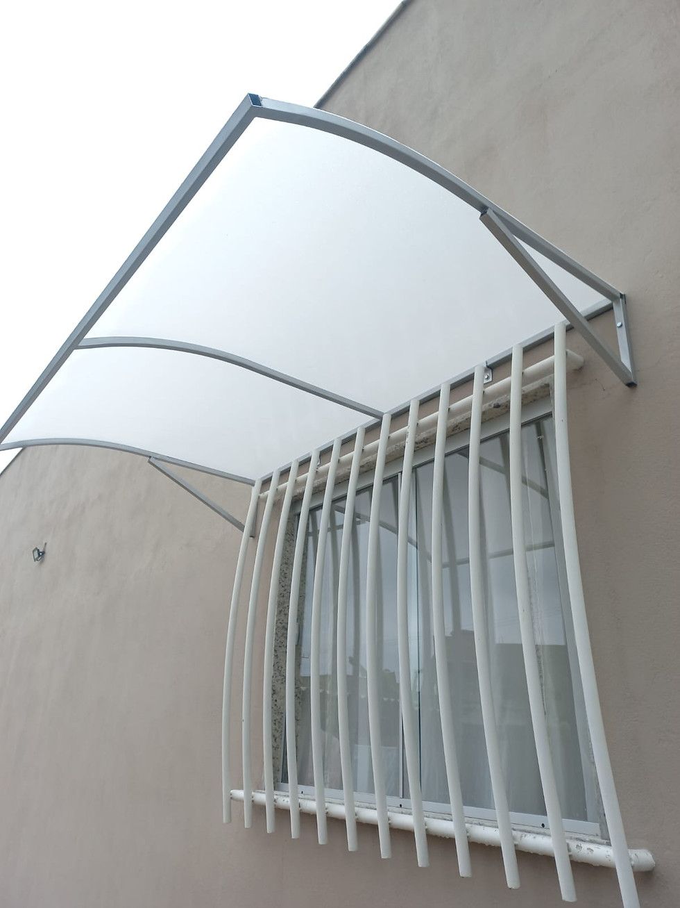 Miniatura: Toldo de Janela Curvado de Lona