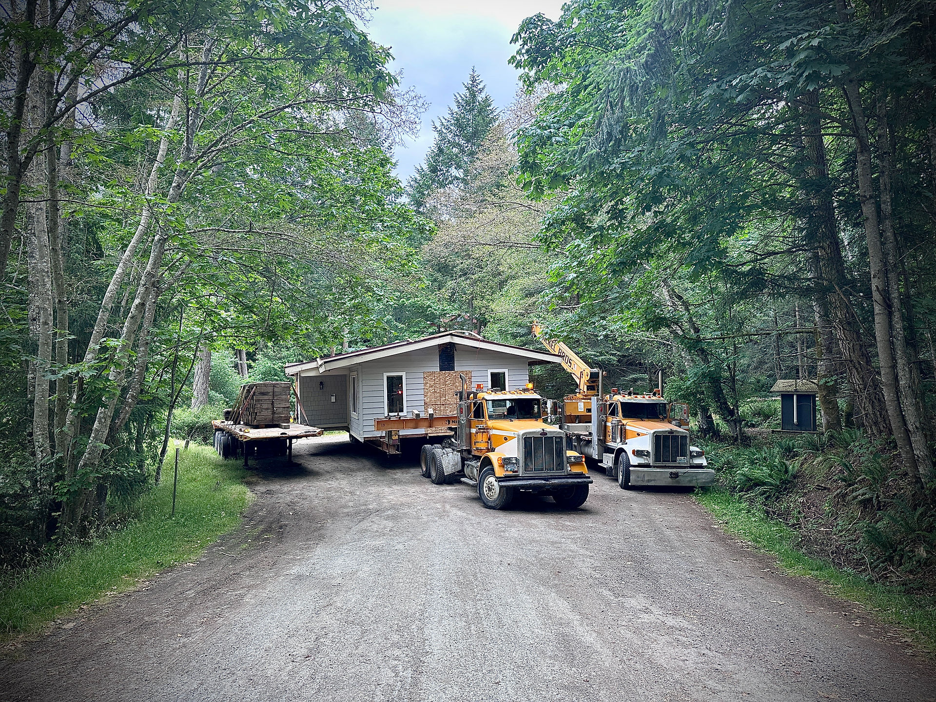 House being moved by Nickel Brothers on Mayne Island