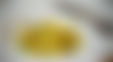 Tortelli di trota con mozzarella e pane nero croccante