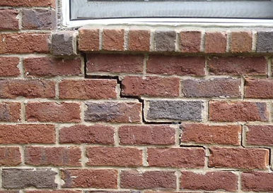 Stair-step brick cracking.