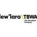 Logo da Lew’Lara\TBWA