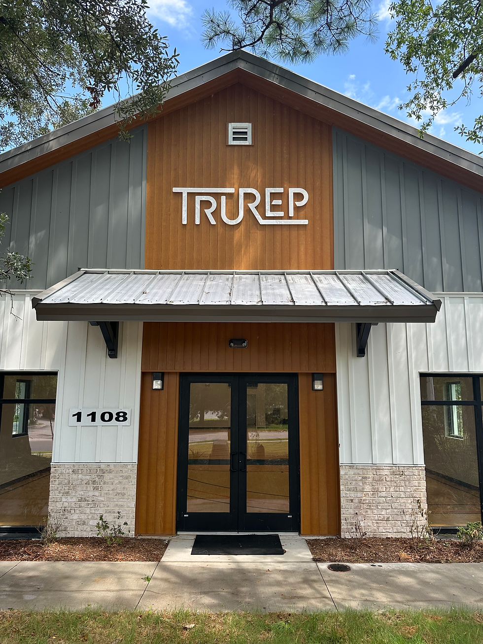 TRUREP building exterior at 1108 with wooden facade.