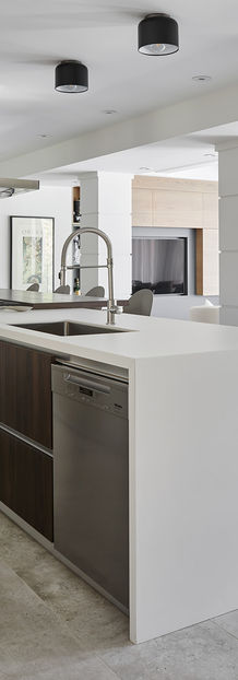 Modern kitchen island with steel range hood