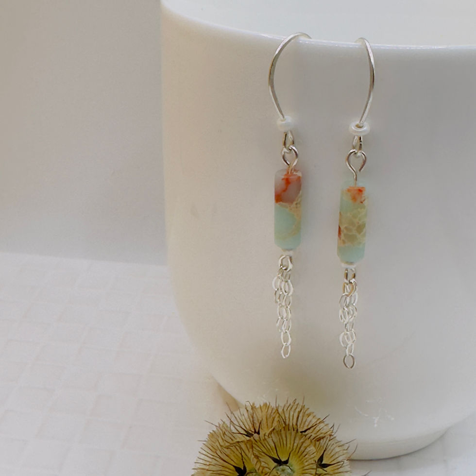 Gemstone earrings on white background. Labradorite Sterling Silver Set for women.