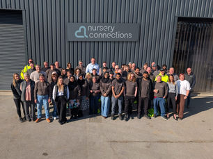 Staff standing together outside their factory in Yorkshire.