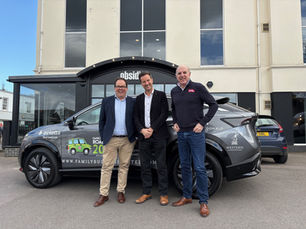 Paul Bence standing outside his office.