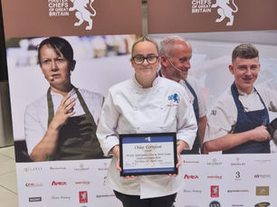 Chloe Cornfoot, proudly holding her national award.