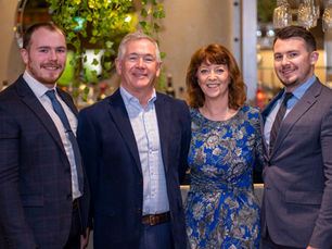 A photo of the Malcolm & Karen Simpson and family.