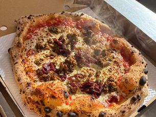 A large looking pizza, made in the Shetlands.