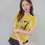 Thumbnail: Kinky Couture Please Fetishize Me yellow T-shirt — bold anime girl graphic holding a sign with text, Japanese streetwear and
