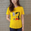 Thumbnail: Kinky Couture Please Fetishize Me yellow T-shirt — bold anime girl graphic holding a sign with text, Japanese streetwear and