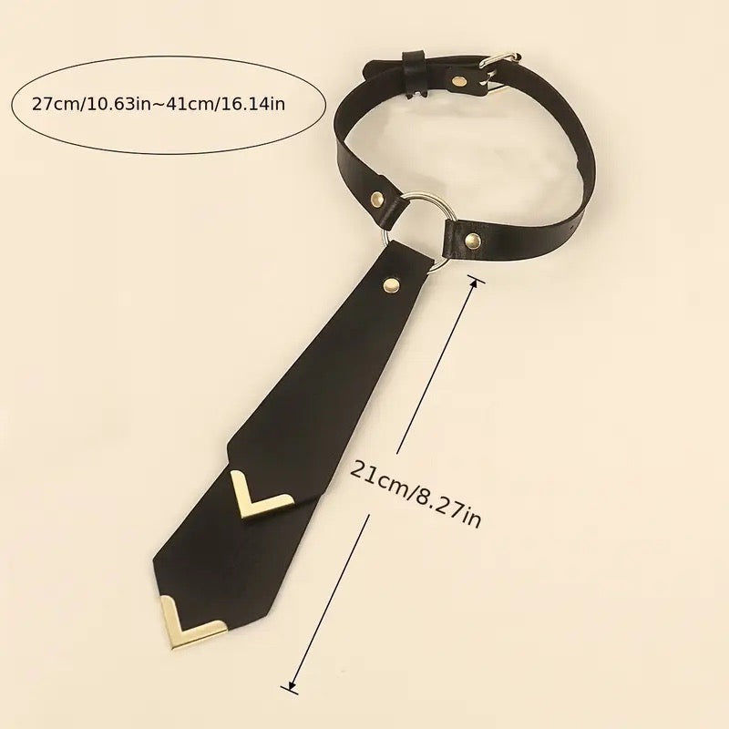 Thumbnail: Kinky Couture Leather O-Ring Tie Choker in black, red, and pink — premium vegan leather bondage-style necktie choker with gol