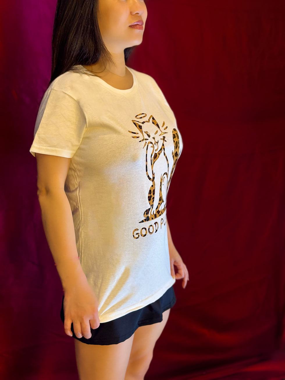 Thumbnail: Women’s Kinky Couture “Good Pussy” T-shirt featuring a leopard print cat graphic with metallic vinyl finish. Soft white cotto