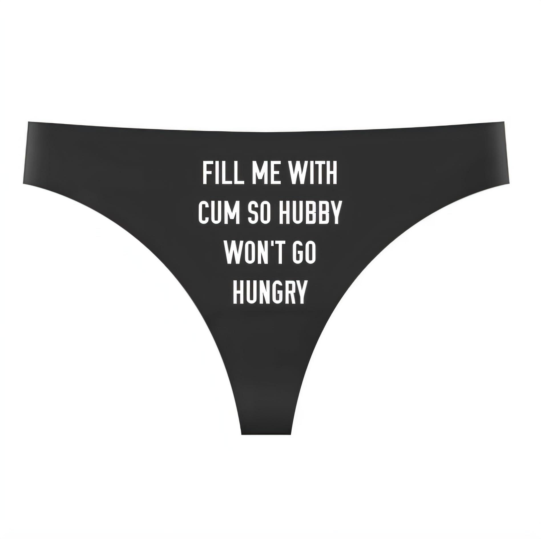 Women's black seamless thong with cheeky Kinky Couture slogan text printed on front.