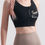 Thumbnail: Kinky Couture Vixen zip-front sports bra in black and white — bold hotwife and vixen-style activewear with front zipper and s
