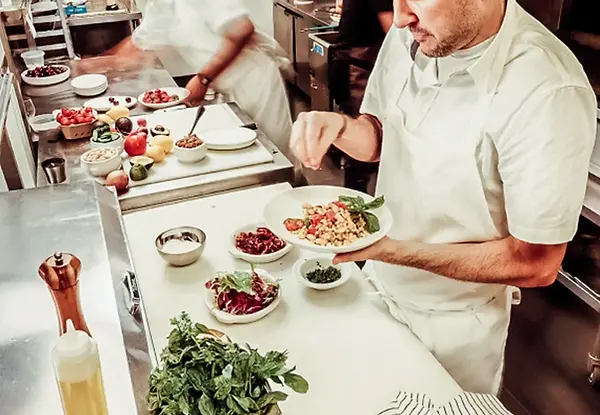 chef-in-the-kitchen-preparing-meal (1).webp