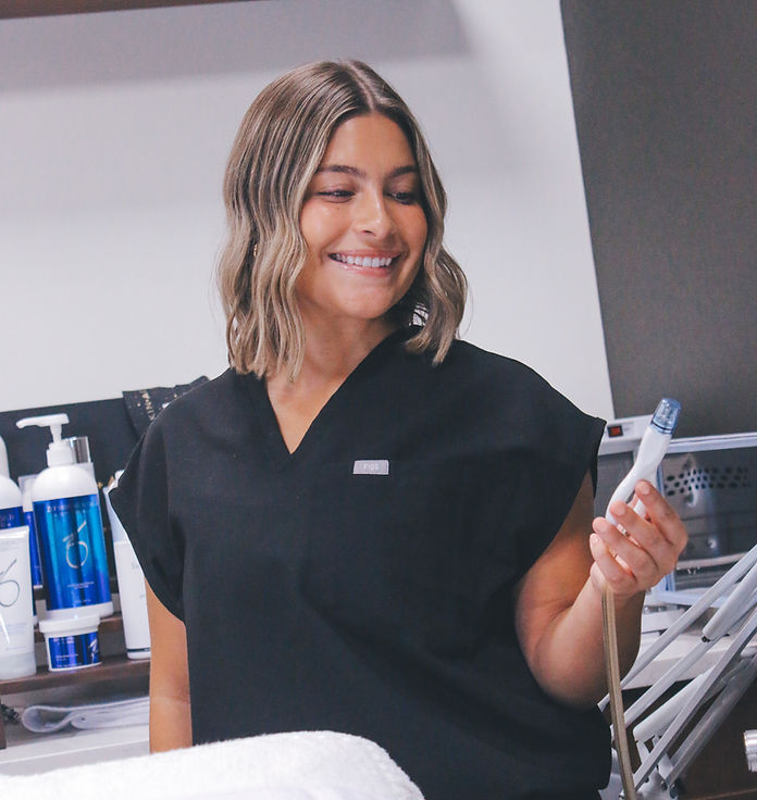 Aesthetician performing Diamond Glow in Woburn MA