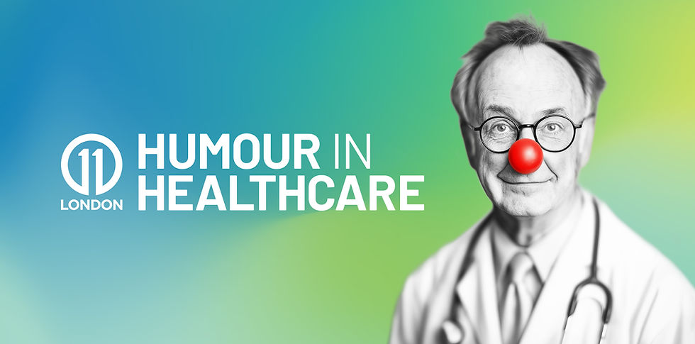 A male doctor looking to camera wearing a red nose