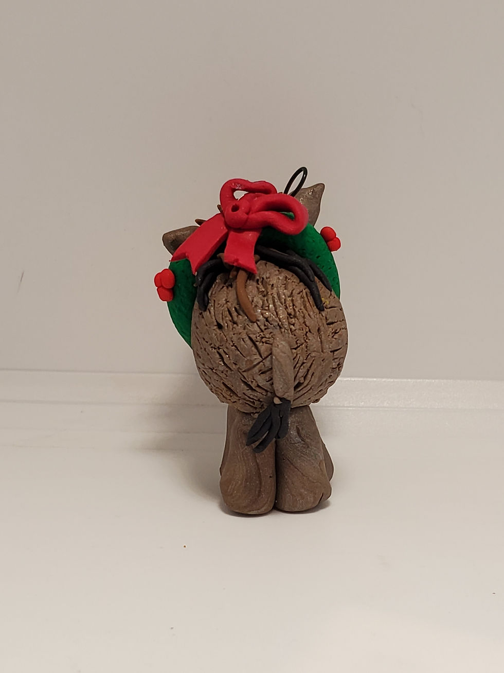 Thumbnail: WARTHOG CHRISTMAS ORNAMENT Adorned with a Holiday Wreath HAND MADE Polymer Clay