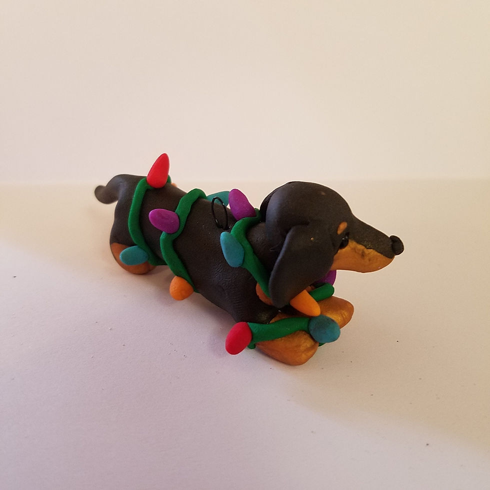 Thumbnail: Dachshund Tangled in Lights Christmas Ornament BLACK AND TAN