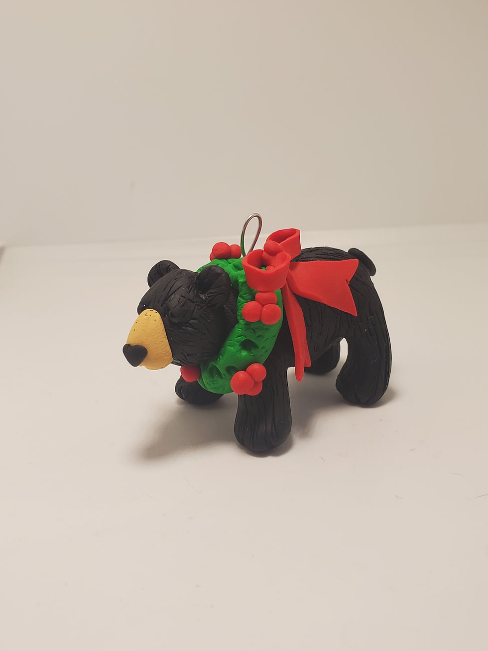 Thumbnail: BLACK BEAR CHRISTMAS ORNAMENT Adorned with a Holiday Wreath HAND MADE Polymer