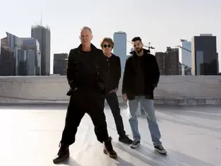 Sting performing live with his stripped-down power trio, featuring Dominic Miller on guitar and Chris Maas on drums, at Hard Rock Live in Fort Lauderdale during the Sting 3.0 Tour